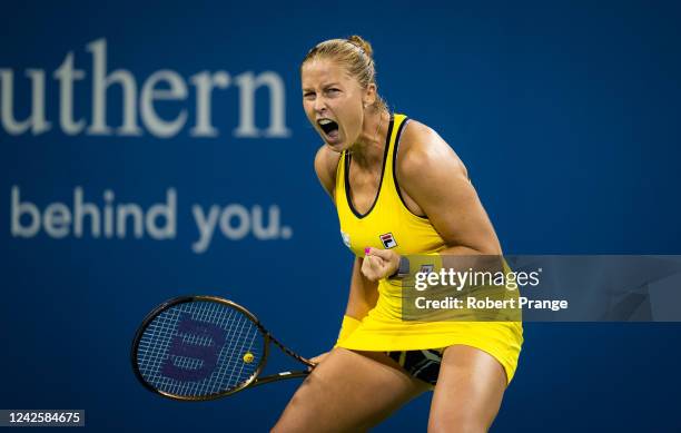 Shelby Rogers of the United States celebrates winning a point against Aryna Sabalenka of Belarus during her third round match on Day 6 of the Western...