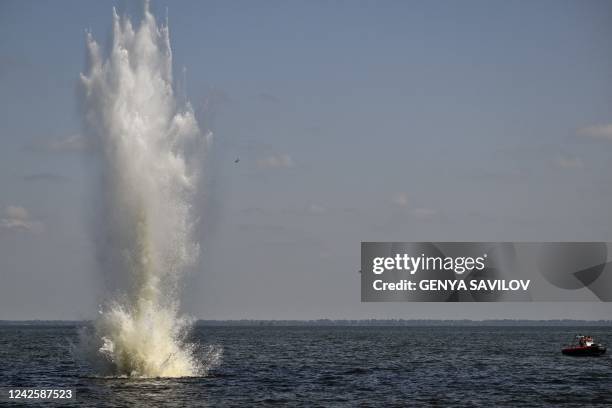 Underwater mine-clearance team of the State Emergency Service of Ukraine deactivate an explosive object found in the Dnieper River in the town of...