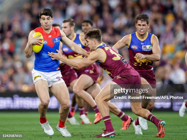 Christian Petracca of the Demons in action during the 2022 AFL Round 23 match between the Brisbane Lions and the Melbourne Demons at The Gabba on...