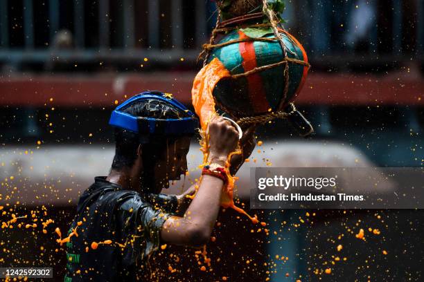 Govindas break the Dahi Handi by forming a human pyramid on the occasion of Gokulashtami festival at Dadar on August 19, 2022 in Mumbai, India. The...