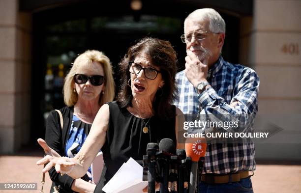 Diane Foley , the mother of James Foley, and Carl and Marsha Mueller, the parents of Kayla Mueller, speak to reporters outside the Albert V. Bryan...