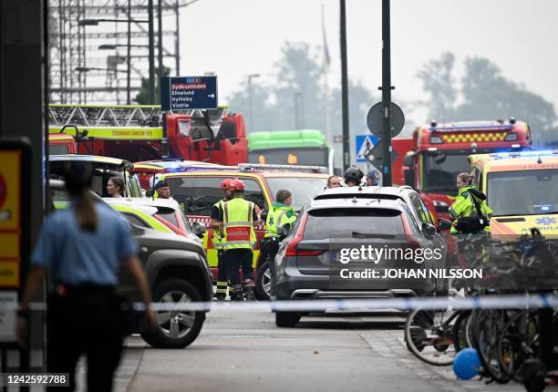 Police secures the area after two persons have been injured in a shooting at Emporia Shopping Center in Malmo, Sweden, on August 19, 2022. - - Sweden...