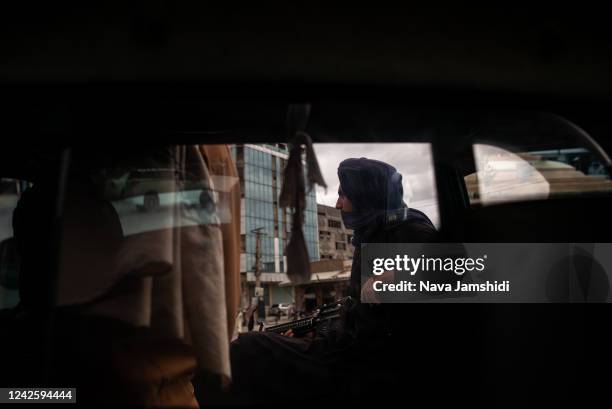 Members of the Taliban patrol the streets of Kandahar on August 19, 2022 in Kandahar, Afghanistan. The collapse of the economy and the freezing of...