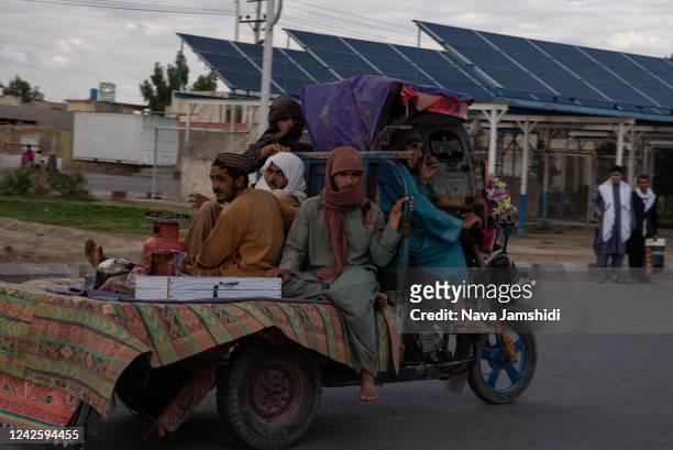 Members of the Taliban patrol the streets of Kandahar on August 19, 2022 in Kandahar, Afghanistan. The collapse of the economy and the freezing of...