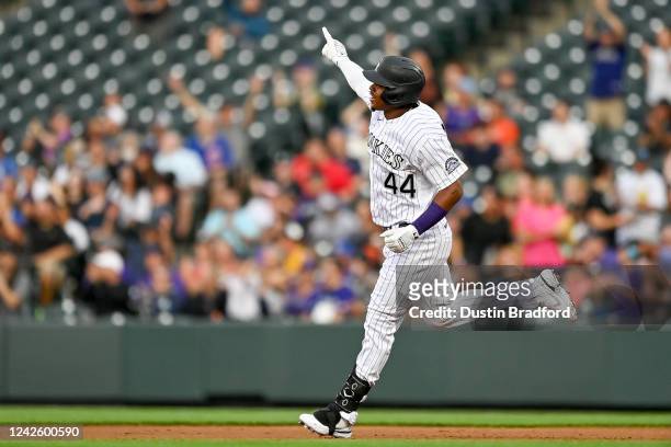 Elehuris Montero of the Colorado Rockies celebrates after hitting a second inning two-run home run against the San Francisco Giants at Coors Field on...