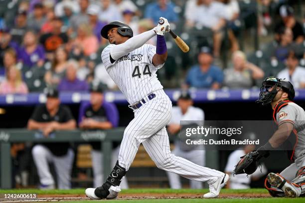 Elehuris Montero of the Colorado Rockies hits a second inning two-run home run against the San Francisco Giants at Coors Field on August 19, 2022 in...
