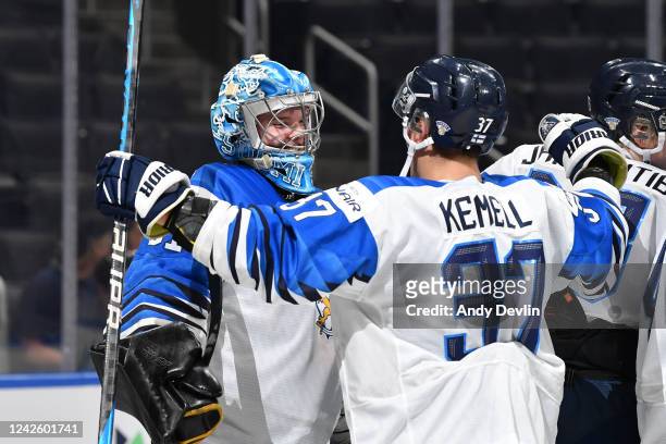 Juha Jatkola and Joakim Kemell of Finland celebrate after winning the game against Sweden in the IIHF World Junior Championship on August 19, 2022 at...