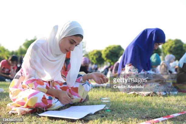 Women take part in a Hadith competition at Yari City Park in Halabja, Iraq on August 19, 2022. This year's competition is held only for women, unlike...