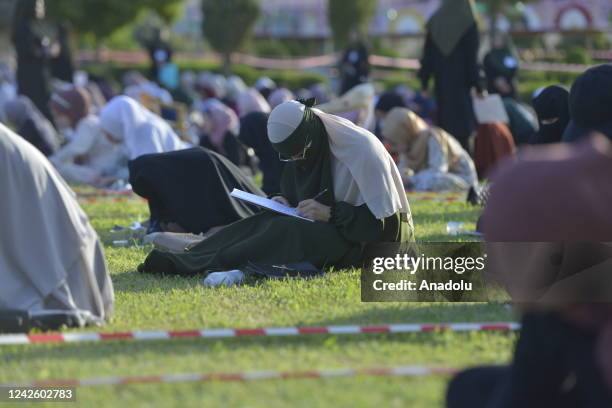 Women take part in a Hadith competition at Yari City Park in Halabja, Iraq on August 19, 2022. This year's competition is held only for women, unlike...