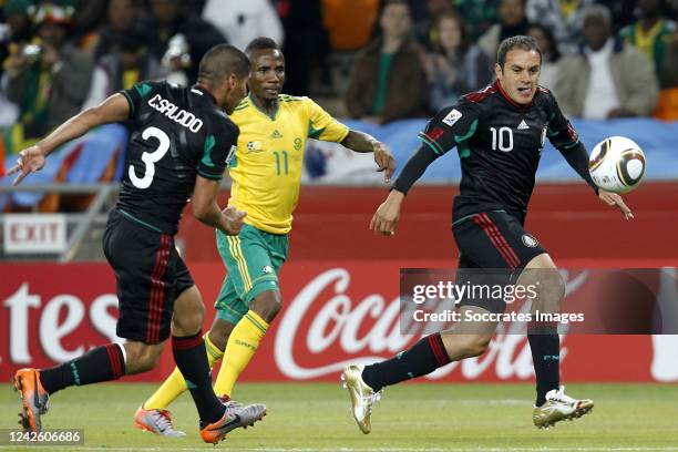 Mexico Carlos Salcido , South Africa Teko Modise , Cuauhtemoc Blanco during the World Cup match between South Africa v Mexico on June 11, 2010