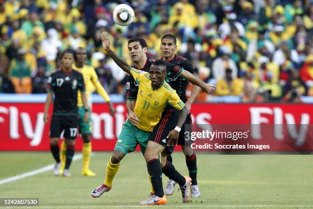 Mexico Rafael Marquez , Carlos Salcido , South AfricaTeko Modise during the World Cup match between South Africa v Mexico on June 11, 2010