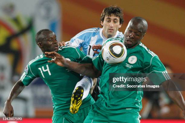 Nigeria Sani Kaita Argentina Diego Milito during the World Cup match between Argentina v Nigeria on June 12, 2010