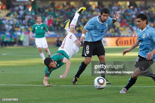 Uruguay Maurice Victorino Mexico Guillermo Franco during the World Cup match between Uruguay v Mexico on June 22, 2010