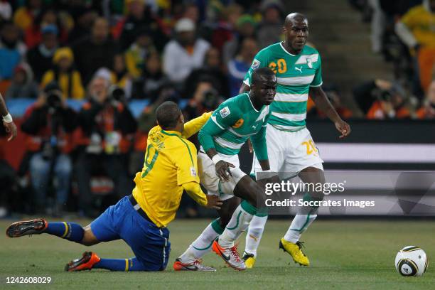 Brazil Luis Fabiano Ivory Coast Cheick Tiote during the World Cup match between Brazil v Ivory Coast on June 20, 2010