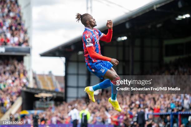 Wilfried Zaha of Crystal Palace celebrates after scoring a goal during the Premier League match between Crystal Palace and Aston Villa at Selhurst...