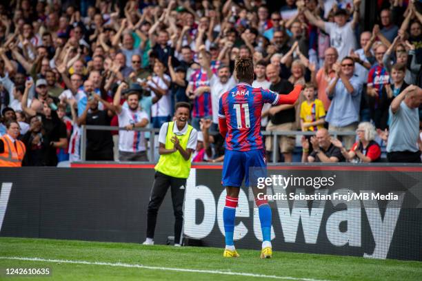 Wilfried Zaha of Crystal Palace celebrates after scoring a goal during the Premier League match between Crystal Palace and Aston Villa at Selhurst...