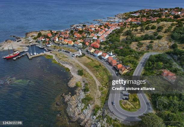 August 2022, Denmark, Gudhjem: The village of Gudhjem on the north coast of the Danish island in the Baltic Sea. The island of Bornholm is - together...