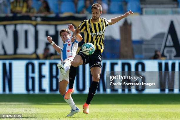 Mats Kohlert of SC Heerenveen, Ferro of Vitesse during the Dutch Eredivisie match between Vitesse v SC Heerenveen at the GelreDome on August 20, 2022...