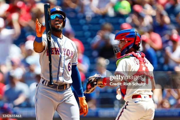 Starling Marte of the New York Mets reacts to striking put in the first inning of game one of a double header at Citizens Bank Park on August 20,...