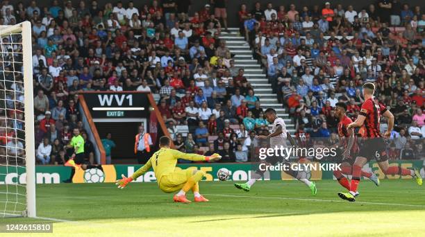 Arsenal's Brazilian striker Gabriel Jesus scores a goal which will be disallowed due to an offside position during the English Premier League...