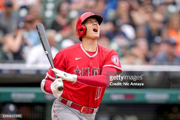 Shohei Ohtani of the Los Angeles Angels reacts in pain against the Detroit Tigers during the top of the seventh inning at Comerica Park on August 20,...