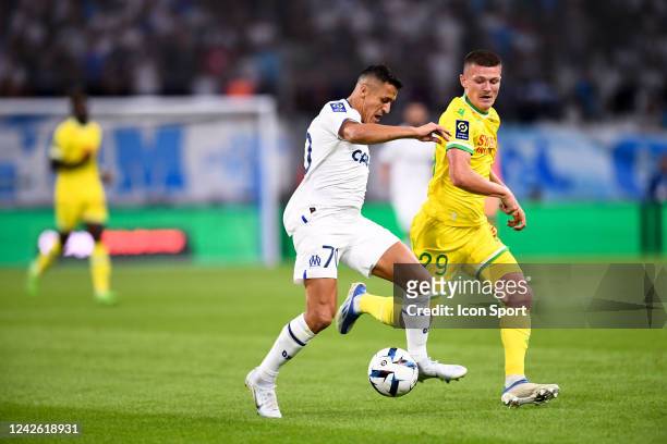 Quentin MERLIN - 70 Alexis Alejandro SANCHEZ during the Ligue 1 Uber Eats match between Olympique de Marseille and FC Nantes at Stade Velodrome on...