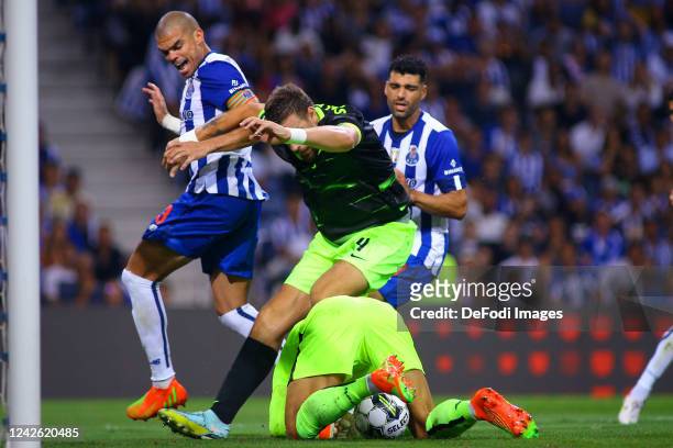 Diogo Costa of FC Porto and Sebastian Coates of Sporting CP battle for the ball during the Liga Portugal Bwin match between FC Porto and Sporting CP...