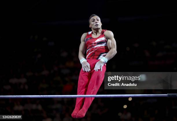 Adem Asil of Turkiye competes on the asymmetric parallel during the Men's Artistic Gymnastics Team Final competitions during the European...