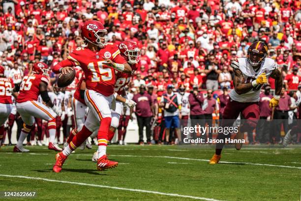 Patrick Mahomes of the Kansas City Chiefs throws a pass during the first quarter of the game against the Washington Commanders at Arrowhead Stadium...
