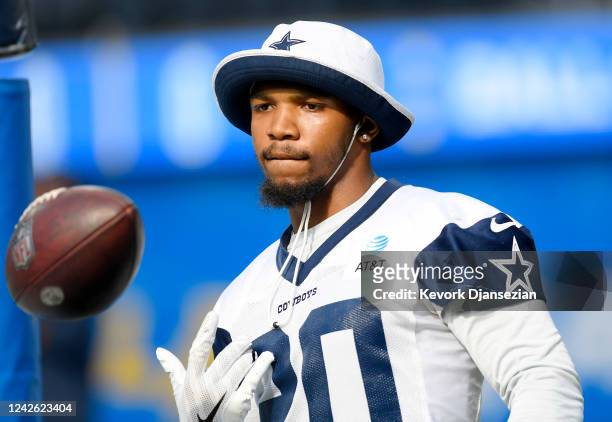 Running back Tony Pollard of the Dallas Cowboys warms up before a preseason game against the Los Angeles Chargers at SoFi Stadium on August 20, 2022...