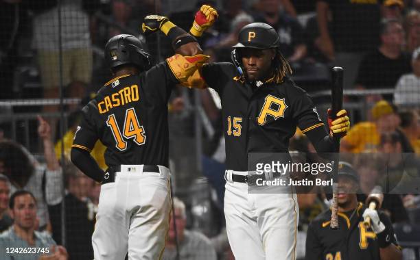 Rodolfo Castro of the Pittsburgh Pirates celebrates with Oneil Cruz after hitting a solo home run in the fourth inning during the game against the...
