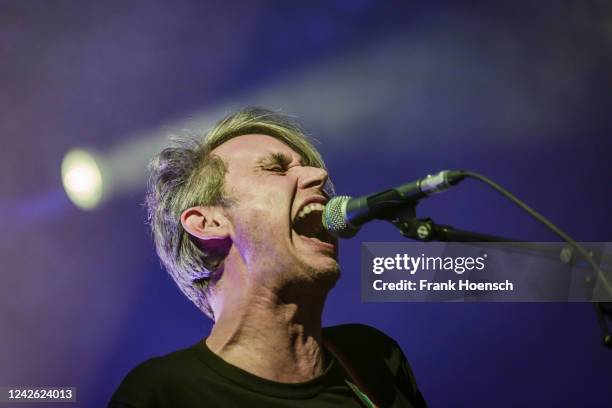 Singer Dirk von Lowtzow of the German band Tocotronic performs live on stage during a concert at the Columbiahalle on August 20, 2022 in Berlin,...