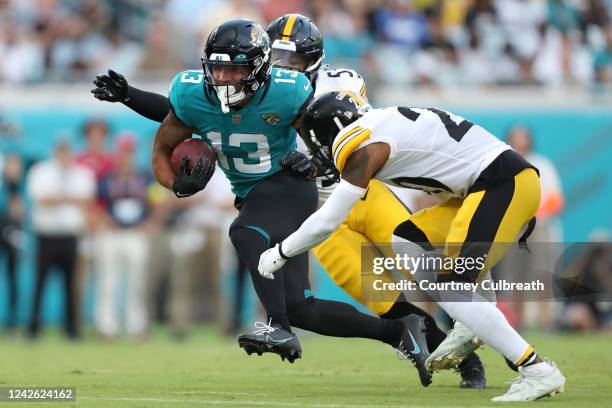 Christian Kirk of the Jacksonville Jaguars catches a pass in the first half against the Pittsburgh Steelers at TIAA Bank Field on August 20, 2022 in...