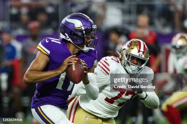 Kellen Mond of the Minnesota Vikings runs with the ball against Kevin Atkins of the San Francisco 49ers in the fourth quarter of a preseason game at...