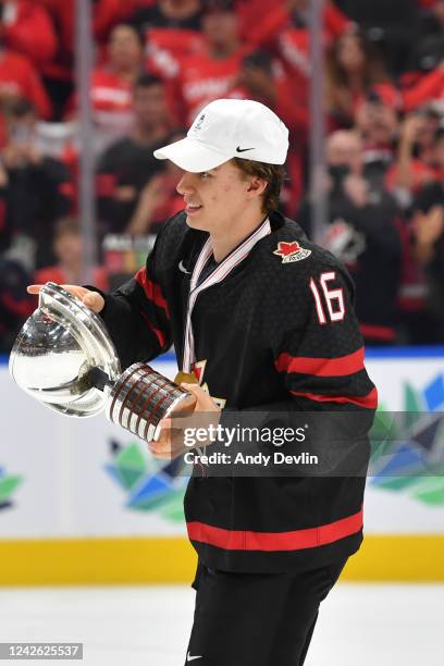 Connor Bedard of Canada skates with the trophy after winning the IIHF World Junior Championship on August 20, 2022 at Rogers Place in Edmonton,...