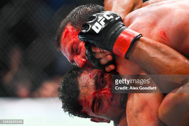 Paulo Costa of Brazil fights Luke Rockhold of the United States in a middleweight bout during UFC 278 at Vivint Arena on August 20, 2022 in Salt Lake...