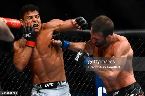 Paulo Costa of Brazil fights Luke Rockhold of the United States in a middleweight bout during UFC 278 at Vivint Arena on August 20, 2022 in Salt Lake...