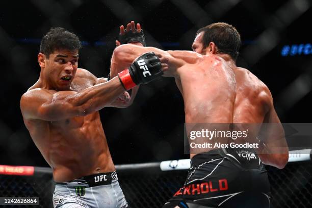 Paulo Costa of Brazil fights Luke Rockhold of the United States in a middleweight bout during UFC 278 at Vivint Arena on August 20, 2022 in Salt Lake...