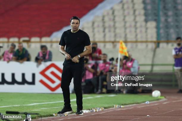 Head coach Javad Nekounam of Foolad FC looks on during the Persian Gulf Pro League match between Persepolis vs Foolad FC at Azadi Stadium on August...