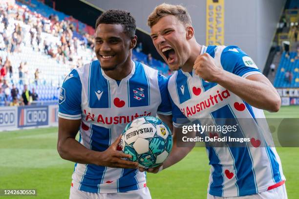 Amin Sarr of SC Heerenveen and Sydney van Hooijdonk of SC Heerenveen looks on during the Dutch Eredivisie match between SBV Vitesse and sc Heerenveen...