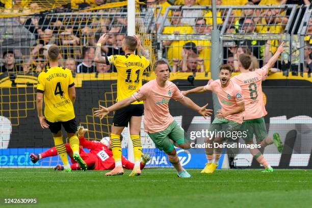 Niklas Schmidt of SV Werder Bremen celebrates after scoring his team's second goal during the Bundesliga match between Borussia Dortmund and SV...