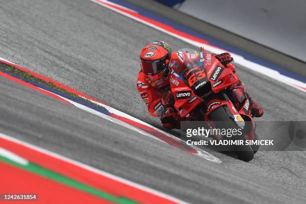 Ducati Lenovo's Italian rider Francesco Bagnaia rides while leading the MotoGP Austrian Grand Prix race at the Redbull Ring racetrack in Spielberg on...