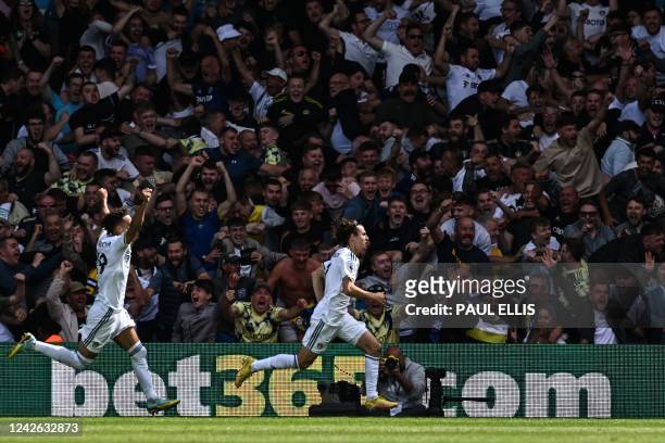 Leeds United's US midfielder Brenden Aaronson celebrates after scoring his team first goal during the English Premier League football match between...
