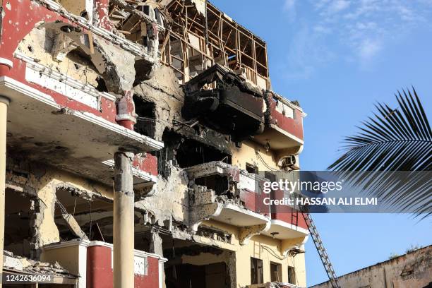 The damaged structure of the Hayat Hotel in Mogadishu is seen on August 21, 2022. - The death toll from a devastating 30-hour siege by Al-Shabaab...