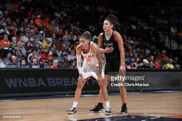 Natisha Hiedeman of the Connecticut Sun plays defense on Veronica Burton of the Dallas Wings during Round 1 Game 2 of the 2022 WNBA Playoffs on...