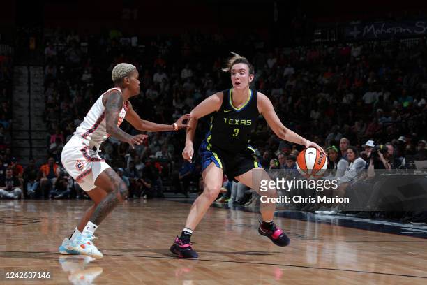 Marina Mabrey of the Dallas Wings drives to the basket against the Connecticut Sun during Round 1 Game 2 of the 2022 WNBA Playoffs on August 21, 2022...