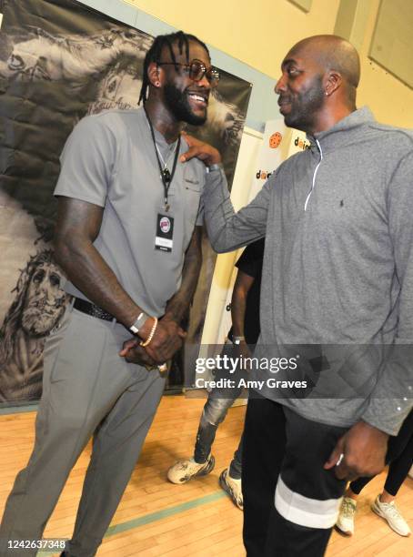 Deontay Wilder and John Salley attend the TJK Classic For HelpCureHD on August 20, 2022 in Santa Monica, California.