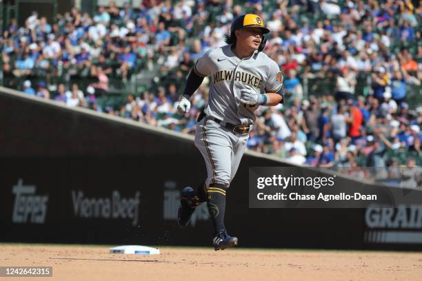 Keston Hiura of the Milwaukee Brewers runs the bases after hitting a home run in the seventh inning against the Chicago Cubs at Wrigley Field on...