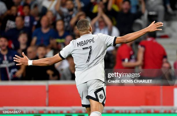 Paris Saint-Germain's French forward Kylian Mbappe celebrates scoring his team's seventh goal during the French L1 football match between Lille OSC...