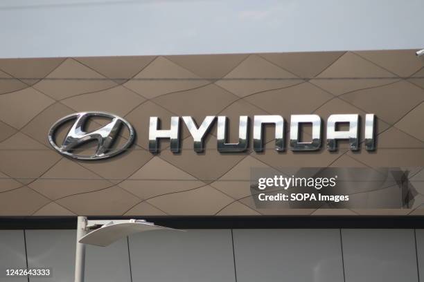 South Korean multinational automotive manufacturer, Hyundai Motors and commonly known as Hyundai logo seen in St. Petersburg. Official car dealers...